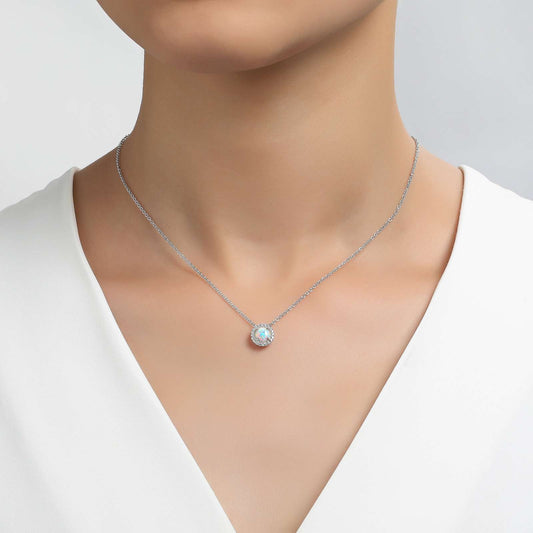 Simulated opal pendant on silver chain.