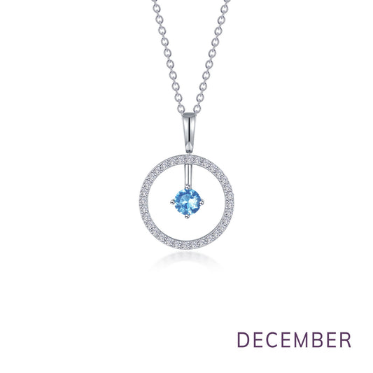 Simulated blue topaz circle pendant necklace.