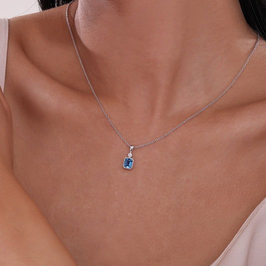 Simulated blue topaz pendant necklace.