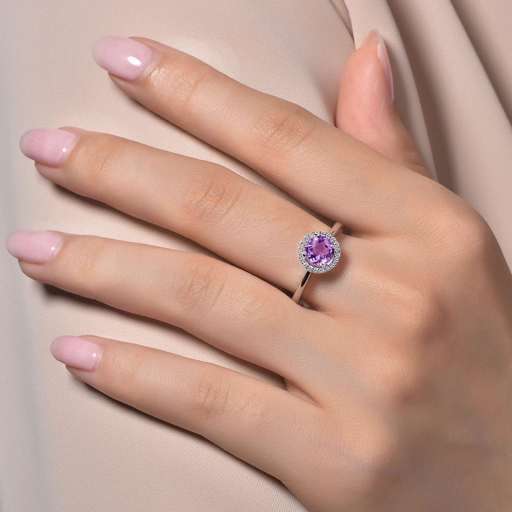 White RO Amethyst ring with simulated diamonds.