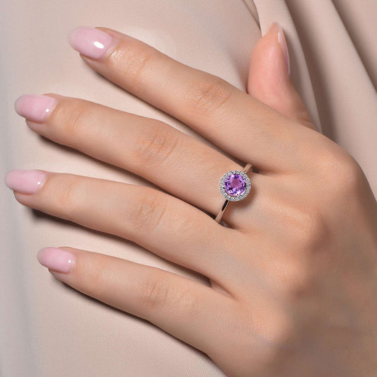 White RO Amethyst ring with simulated diamonds.