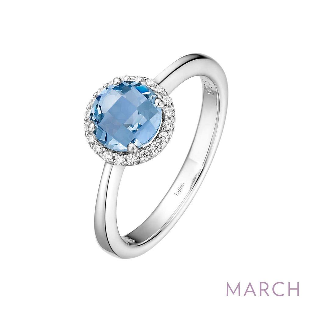 Simulated aquamarine ring with diamond accents.