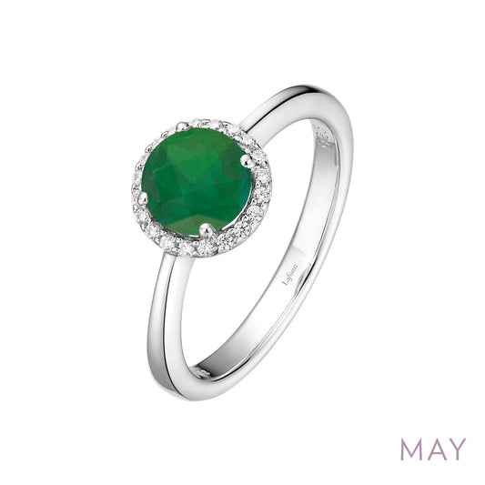 Simulated emerald ring with diamond accents.