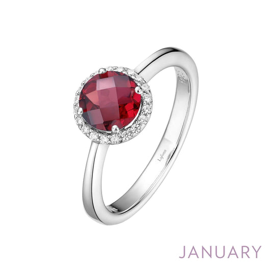 Round garnet ring with simulated diamonds.