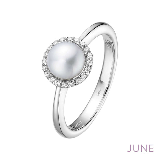 White pearl ring with diamond accents.