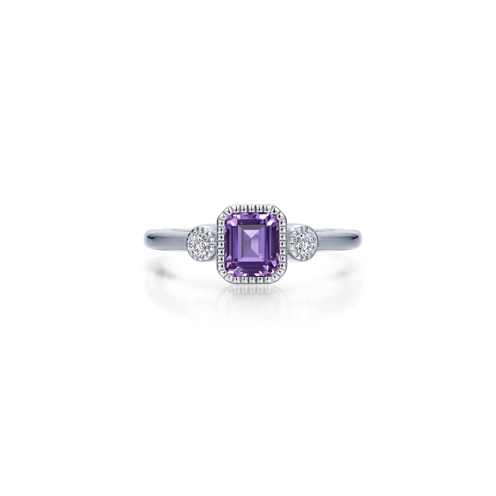 Emerald-cut amethyst ring with diamond accents.