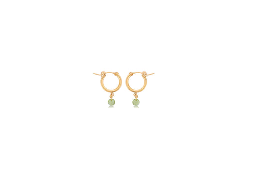 Gold hoops with dangling green peridot stones.
