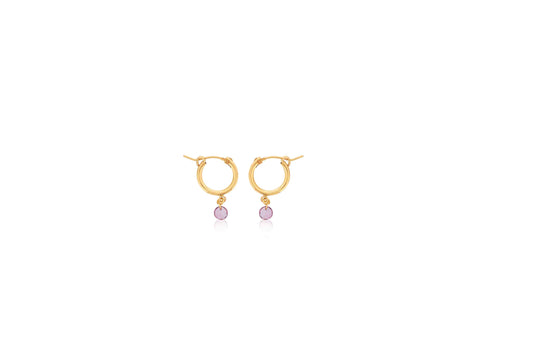 Gold hoop earrings with pink gemstones.