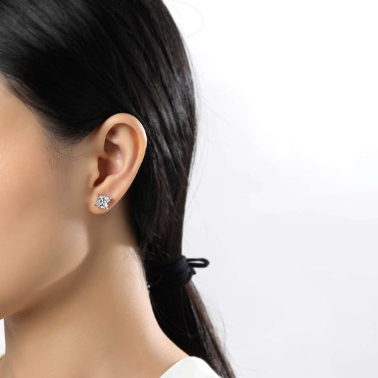 Princess-cut cubic zirconia stud earrings.