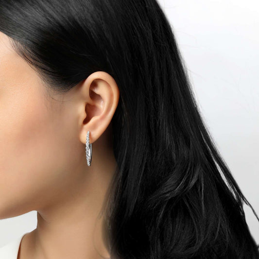 Medium hoop earrings with simulated diamonds.
