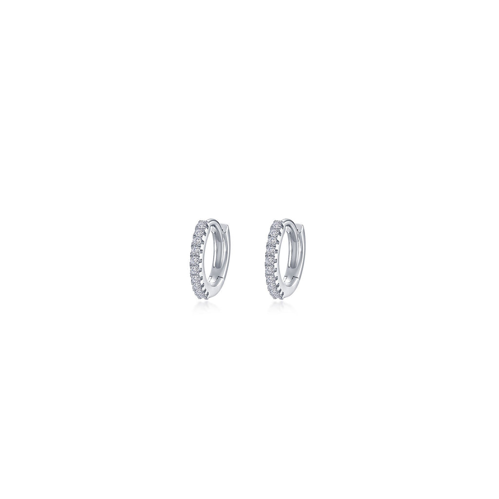 Simulated diamond huggie earrings in silver.