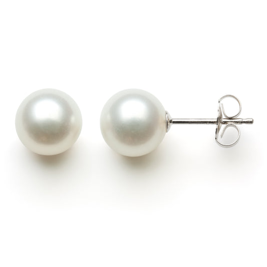 White pearl stud earrings in white gold.