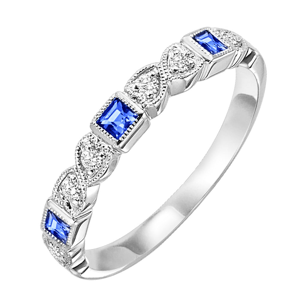 White gold band with princess sapphires.
