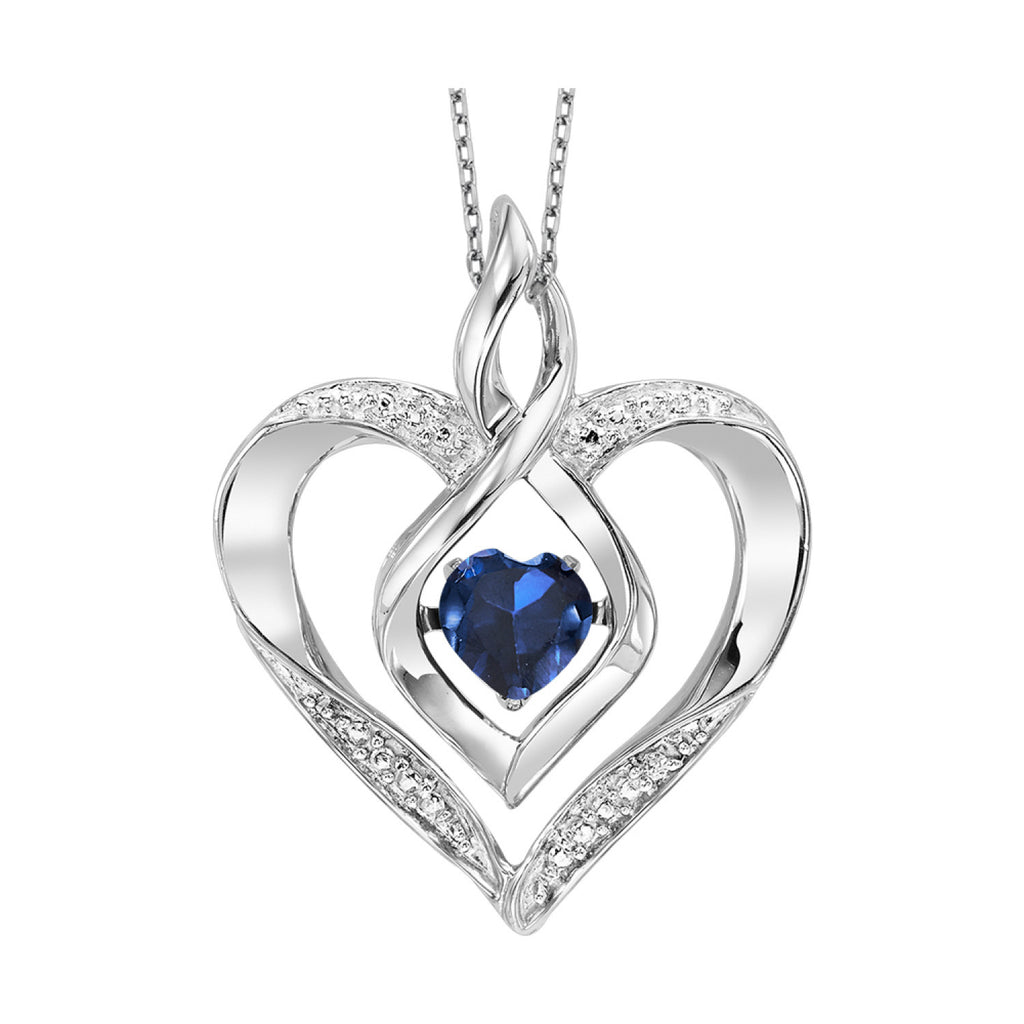 Heart-shaped sapphire necklace in sterling silver.