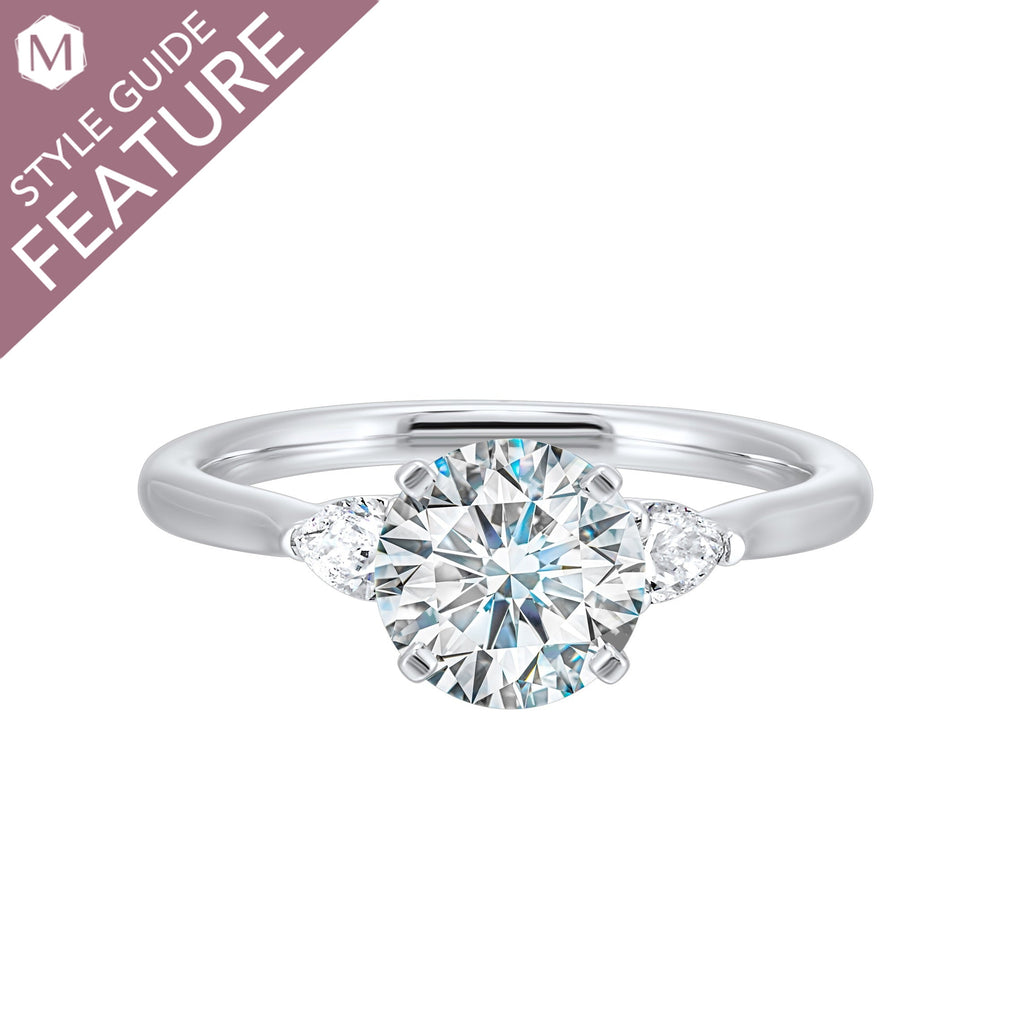 Three-stone diamond ring in white gold.