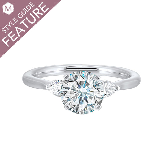 Three-stone diamond ring in white gold.