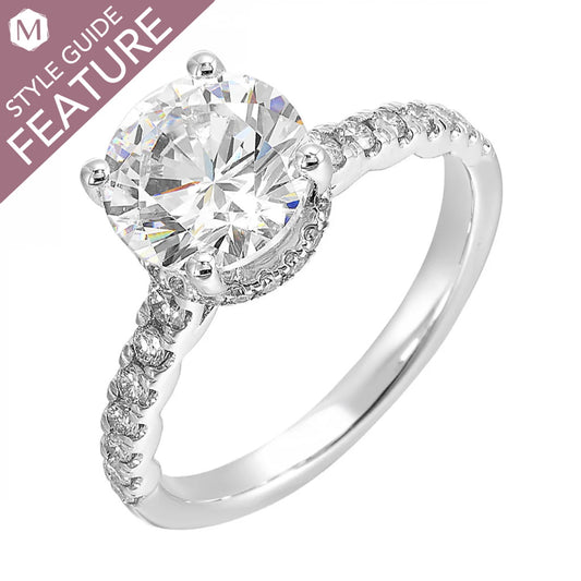 14K white gold ring with round diamonds.