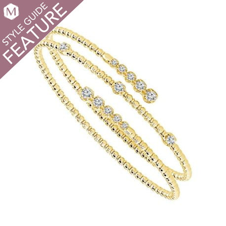 Yellow gold bracelet with round diamonds.