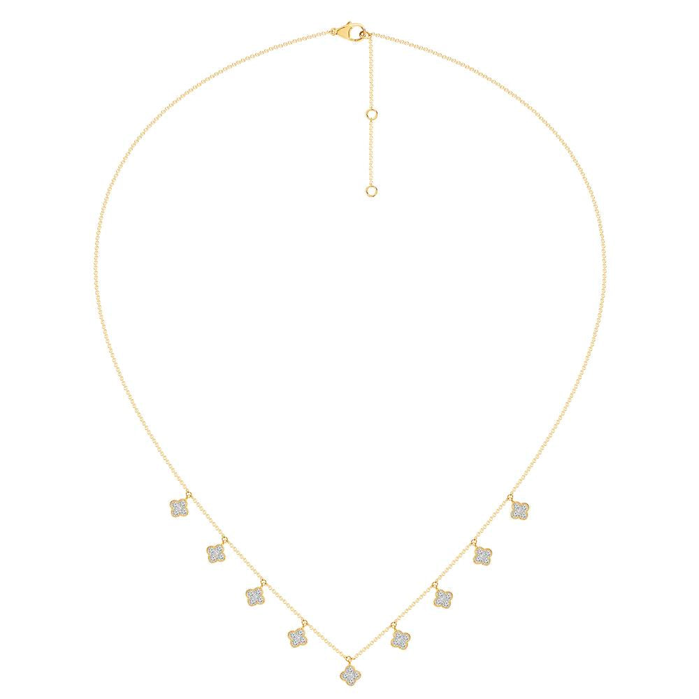 Clover design diamond necklace in yellow gold.