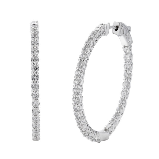 14K white gold diamond hoop earrings.