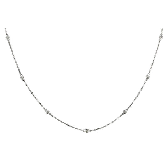 Round diamond necklace, 14K white gold chain.