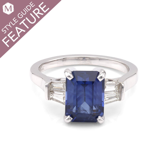Emerald-cut sapphire ring with baguette diamonds.