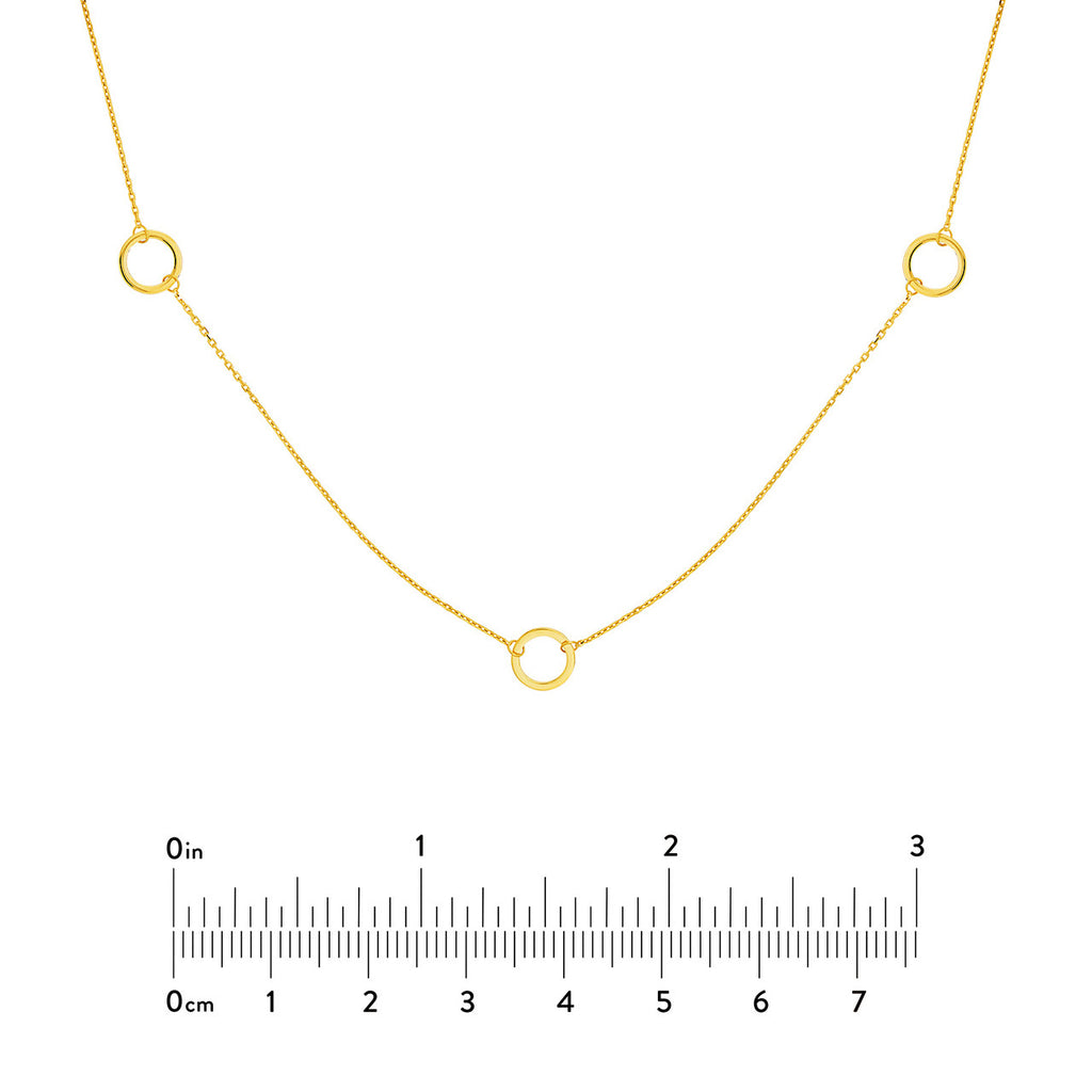 14K yellow gold necklace with circle stations.