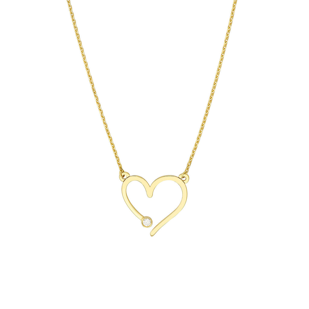 Heart-shaped gold necklace with diamond.