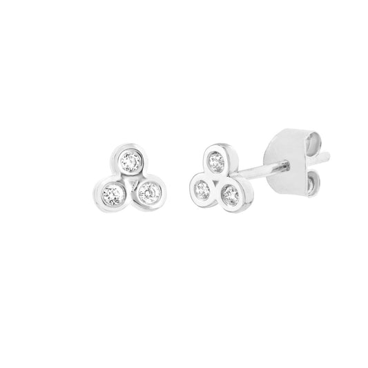 Three-diamond cluster stud earrings in white gold.