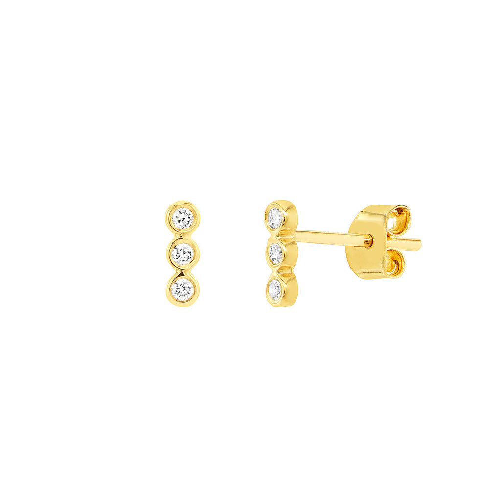 Three round diamond studs, yellow gold.