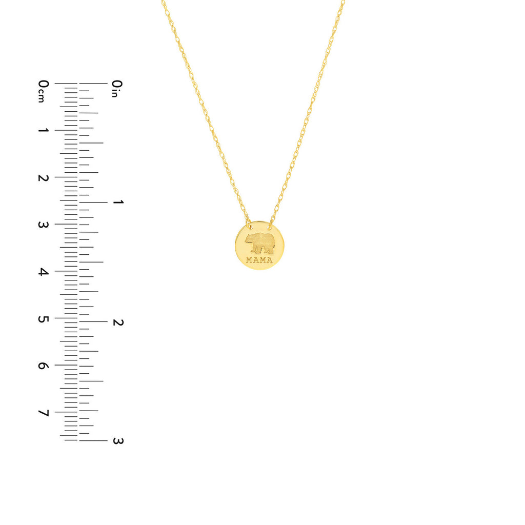 Yellow gold necklace with engraved bear pendant.