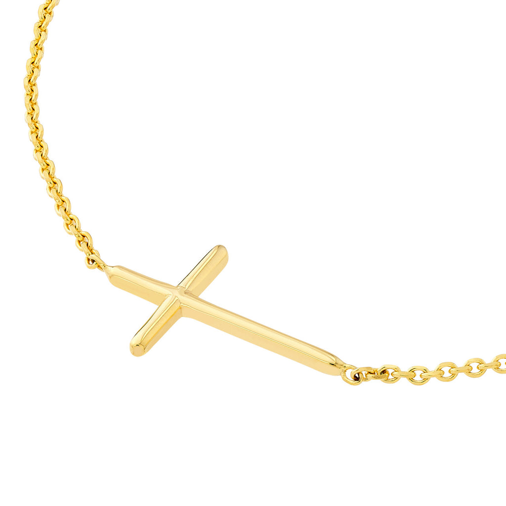14K yellow gold cross necklace.