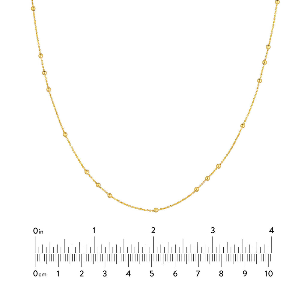 14K yellow gold station necklace.