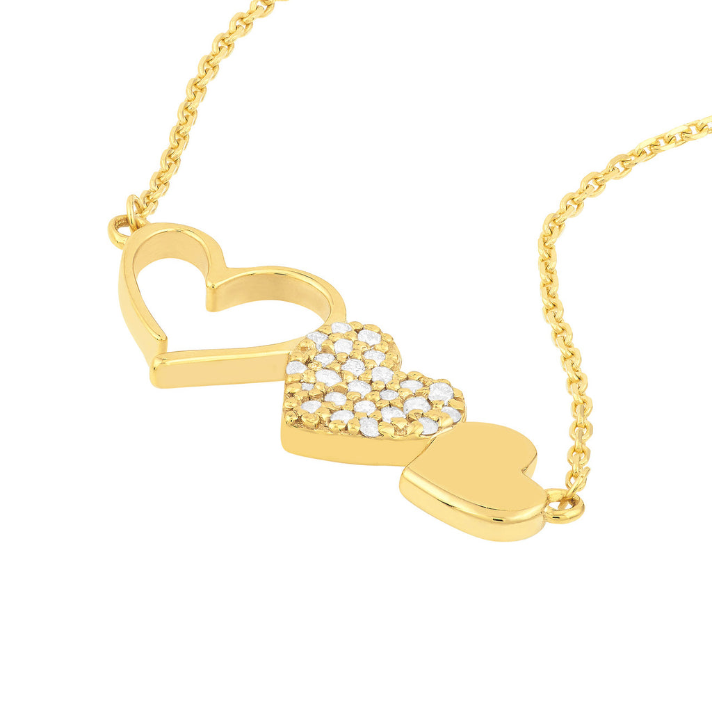 Heart-shaped diamond necklace in yellow gold.