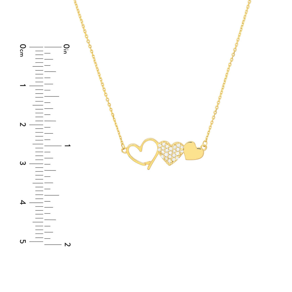Heart-shaped diamond necklace in yellow gold.