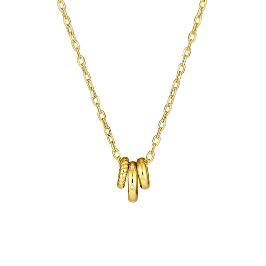 Yellow gold necklace with diamond-accented rings.