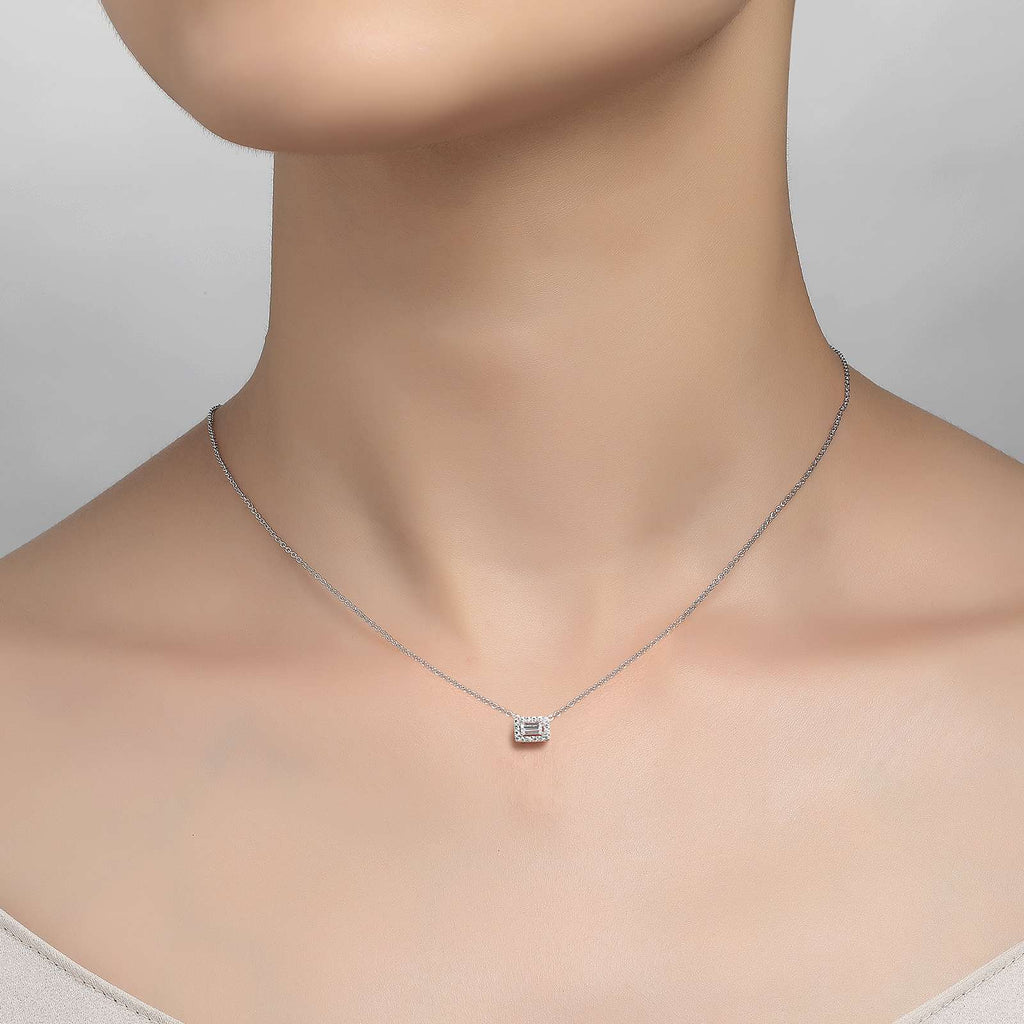 Simulated diamond necklace on model's neck.