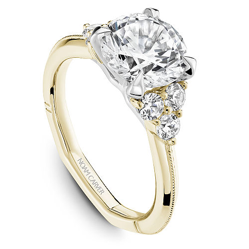 Yellow gold ring with round diamonds.