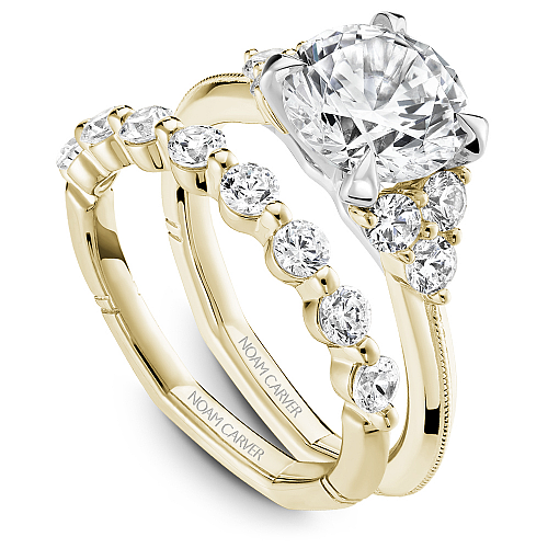 Yellow gold ring with round diamonds.