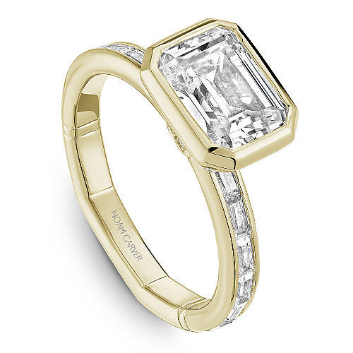 Yellow gold ring with baguette and round diamonds.