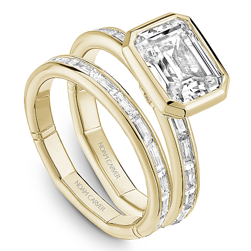 14K yellow gold ring with baguette diamonds.