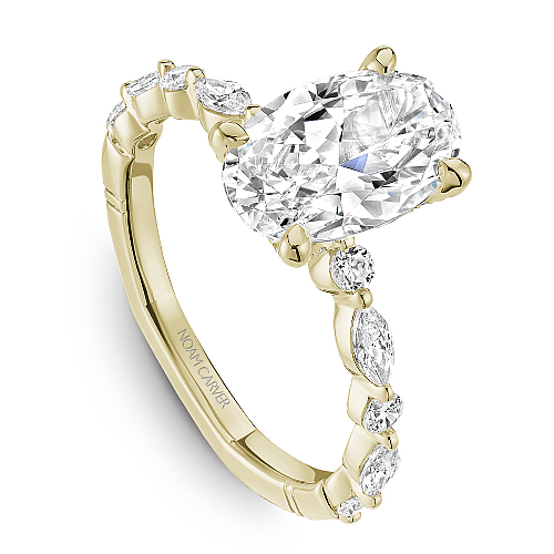 14K yellow gold ring with marquise diamonds.