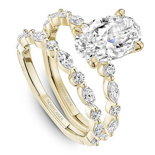 14K yellow gold ring with marquise diamonds.