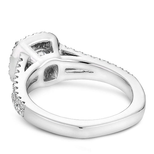 14K white gold ring with diamond halo.