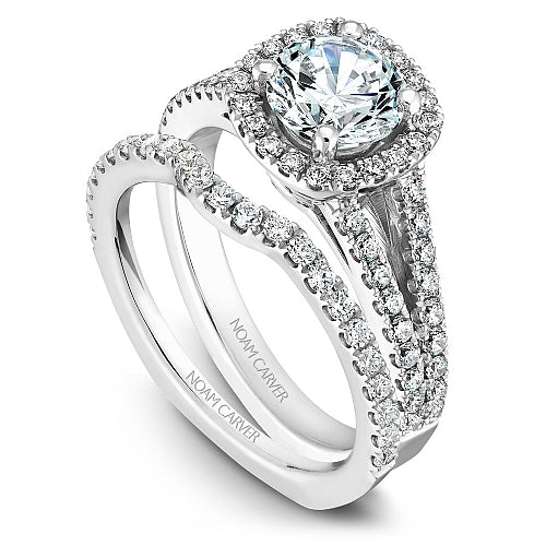 Halo diamond ring in white gold.
