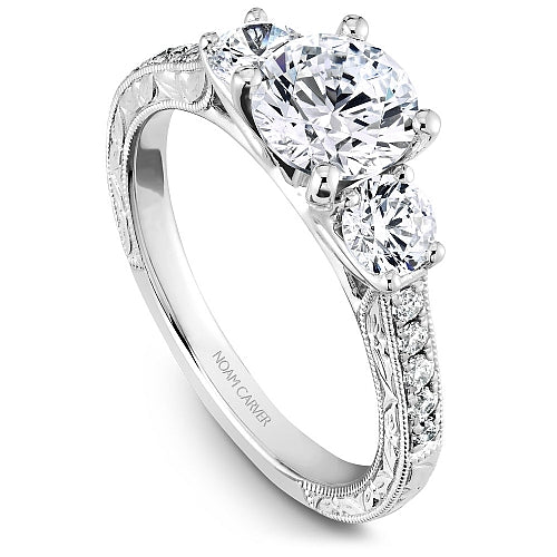 Three-stone diamond ring with side accents.