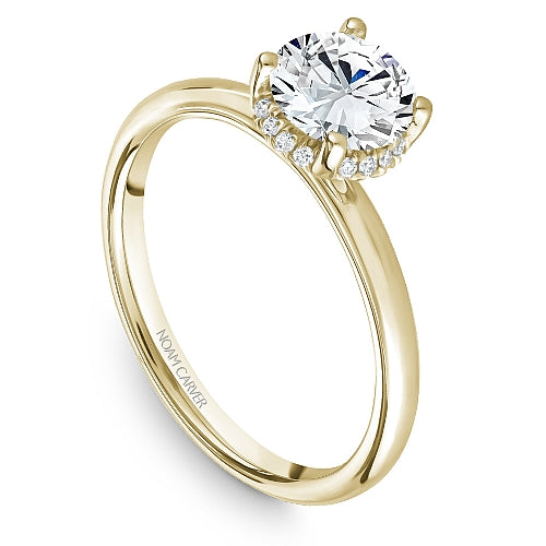 Yellow gold ring with round diamond accents.
