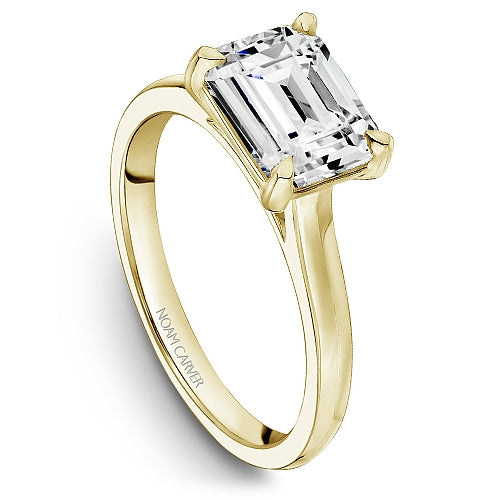 14K yellow gold solitaire diamond ring.