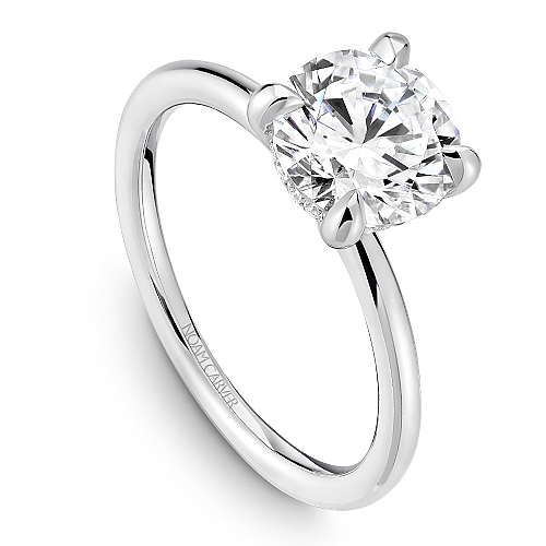 Solitaire diamond ring in white gold.