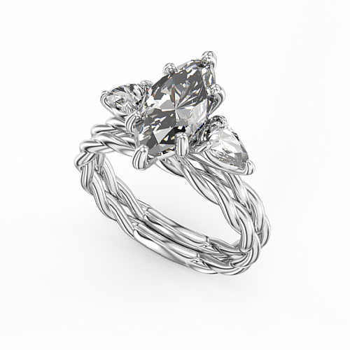 Three-stone diamond ring with pear accents.